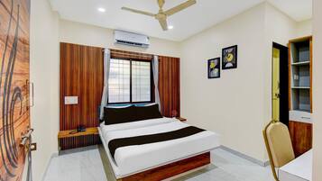 1 bedroom, desk, bed sheets