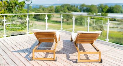 Luxury vacation apartment Seesehnsucht Höri with lake view and whirlpool bathtub.