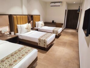 Premium Triple Room | Laptop workspace, blackout drapes, iron/ironing board, free WiFi - Hotel Camel managed by CLAY (Mundra)
