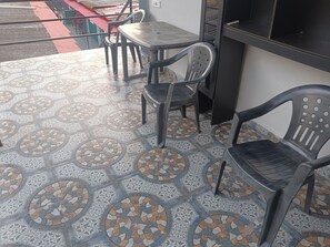 Terrace/patio - Peaceful and relaxing 2 bedroom apartment  just 15 minutes to the sun set beach. (Betalbatim)