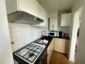 Apartemen | Dapur pribadi | Kursi makan untuk bayi