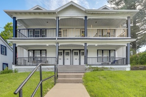 A two-story building with a porch, a staircase, and a railing. - 8 Mi to Micron Technology! Walkable Phoenix Gem (Phoenix)