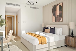 A modern hotel room with a large bed, bedside tables, a desk, and a chair. - Silkhaus Canal View 1BR Apartment In Reem Island (Abu Dhabi)