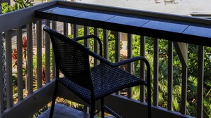 A balcony with a view of a beach, palm trees, and a marina. - Harbor & Ocean View Coastal Retreat – Walk to Beach & Marina (Oceanside)
