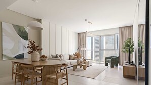 A modern living room with a dining area, large windows, and a minimalist design. - Silkhaus Brand New 1bdr Radiant Reem Island (Abu Dhabi)