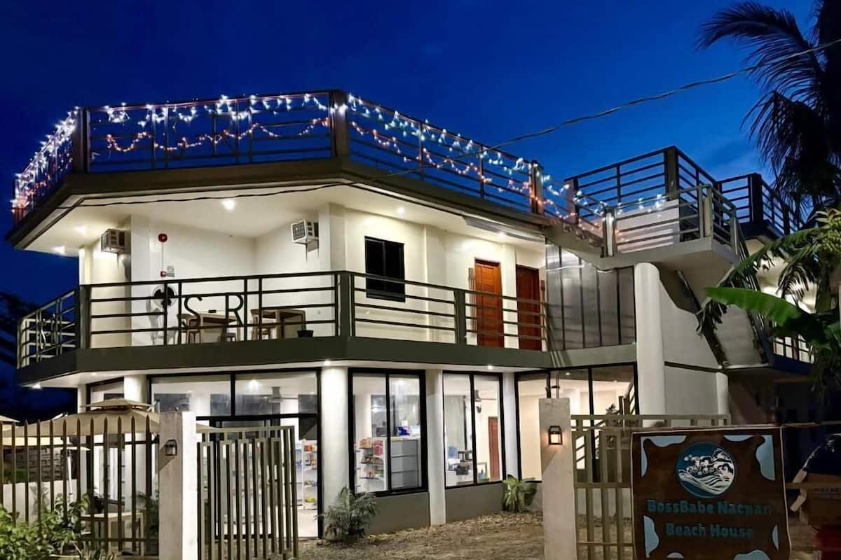 Desk, laptop workspace, blackout drapes, iron/ironing board