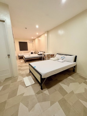 Desk, laptop workspace, blackout drapes, iron/ironing board - Bossbabe Nacpan Beach House (puerto princesa city)