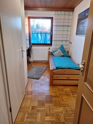 Single room with private bathroom and kitchenette. 
