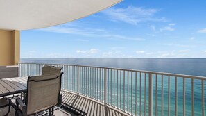 Outdoor dining - Emerald Isle 1808 - Front row chair service included! Affordable rates! (Panama City Beach)