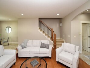 Living area - 4 miles to " The Chuck" for CWS, 3 bed each with private bath, super clean! (Omaha)
