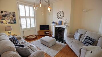 TV, fireplace, books, offices