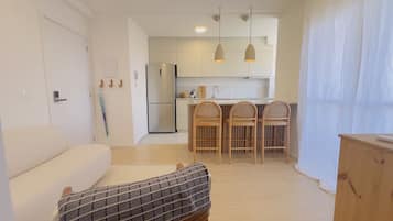 Apartamento conforto | Área de estar | TV