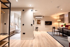 Suíte estúdio com design assinado | Área de estar