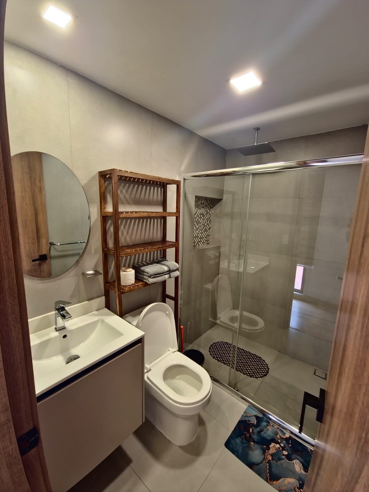 Shower, towels, soap, toilet paper