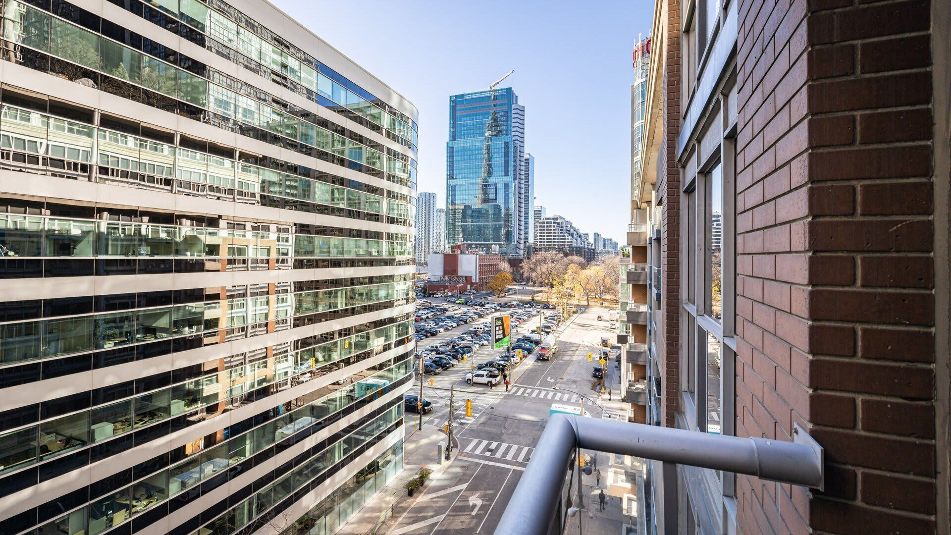 The view from your balcony of the city.