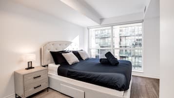 Warm and cozy bedroom with a queen size bed.