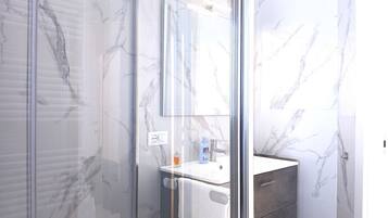 Ducha, bidet, toallas