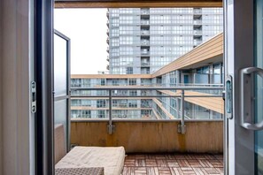 Private balcony with outdoor furniture. - 1BR City Escape: Downtown Condo w/Private Balcony (Toronto)