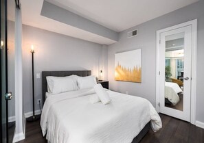 Bedroom featuring a queen size bed - One of Toronto's finest 1BR Condo with a WFH Setup (Toronto)
