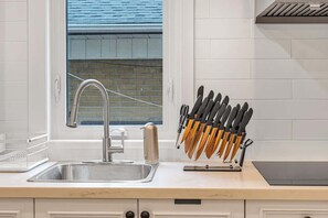 Whip up your favorite meals in the fully equipped kitchen with modern appliances! - Cozy 2BR Home with Workspace | Toronto Retreat (Toronto)