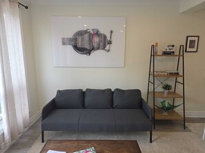 Kick back and relax in this stylish living room! - Cozy 2BR Home with Workspace | Toronto Retreat (Toronto)