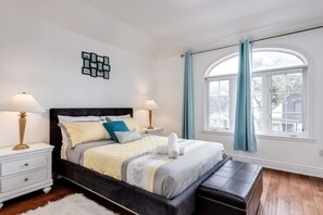Bedroom featuring a warm Queen size bed