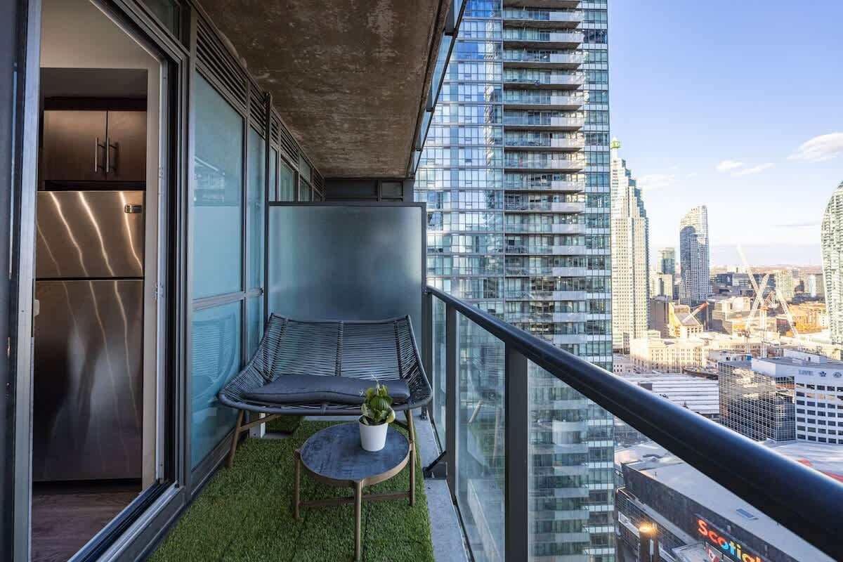 Private balcony with outdoor furniture and great city views