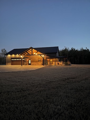 Exterior. Kid friendly vacation home with pool and garage bonus area with a pool table!