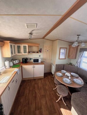 Private kitchen - Coastfields MC27 3-bedroom caravan in quaint Ingoldmells perfect for families (Ingoldmells)