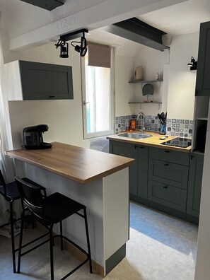 Imagen sin descripción, 5 de 15, botón