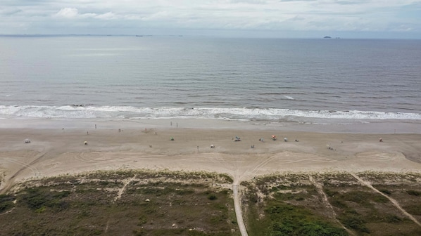 On the beach, sun loungers