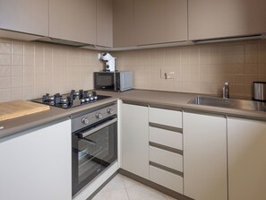 Fridge, microwave, cookware/dishes/utensils - Cinquantina by Interhome (Cecina)