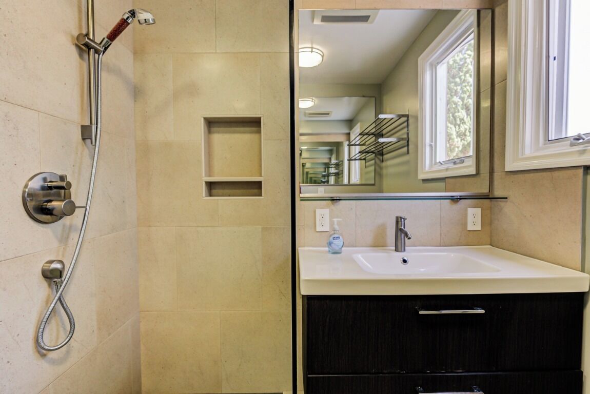 Shower, hair dryer, towels, toilet paper