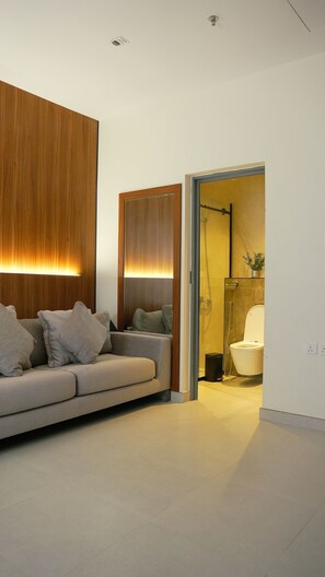 Comfort Suite, City View | Living area | 30-inch flat-screen TV with digital channels