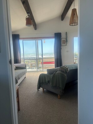 Living area - Sublime Beachfront - views to die for, your in the wave, pet friendly (Ōtaki Beach)