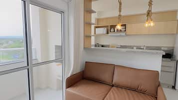Apartamento conforto | Área de estar | TV de tela plana