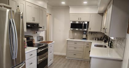 3-bedroom house with back patio and screened in porch.