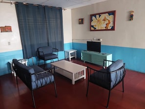 Appartement familial, balcon, vue sur le jardin | Aire de séjour