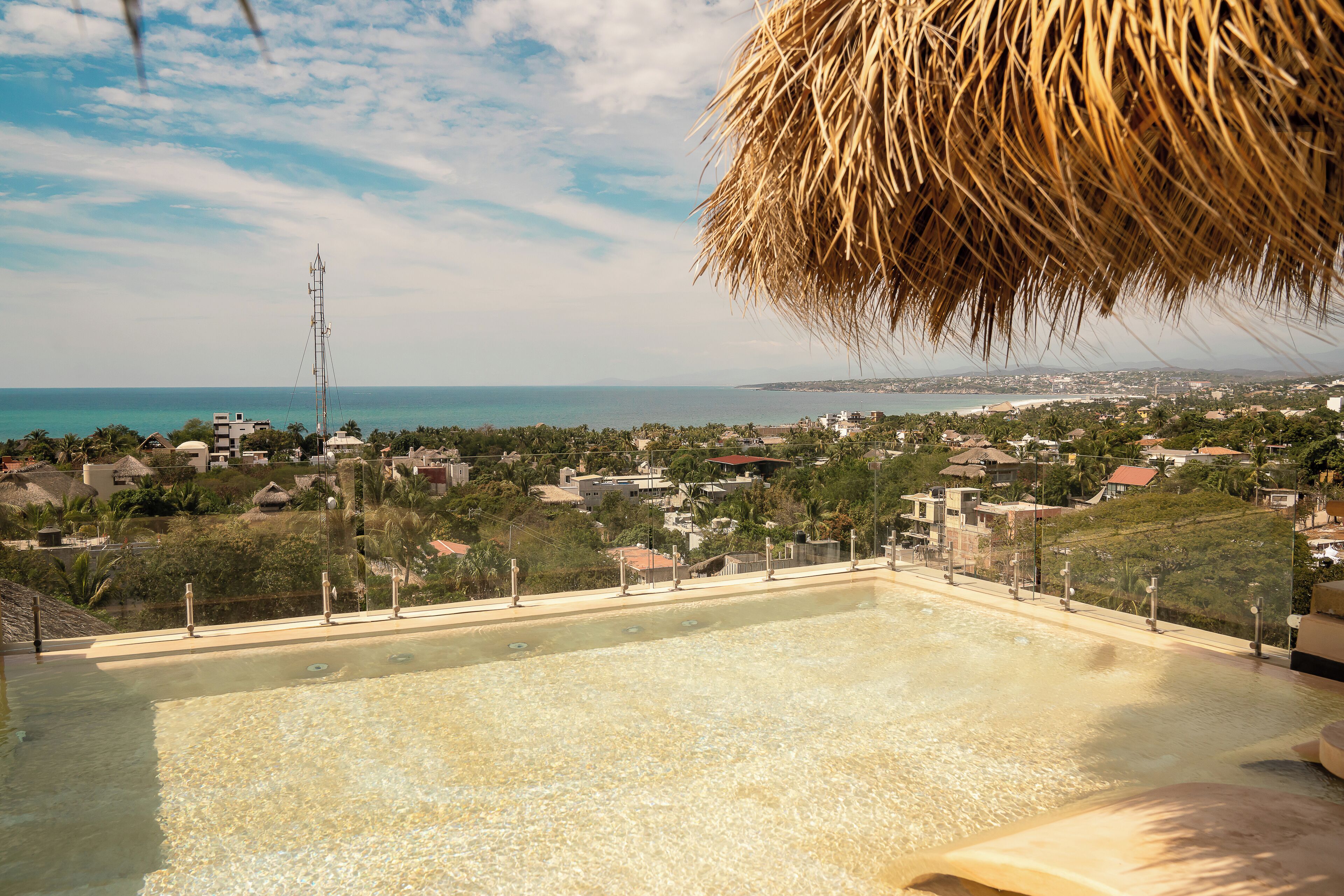 Outdoor pool, pool umbrellas, sun loungers