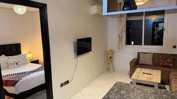 Studio Classique, vue ville | Coin séjour