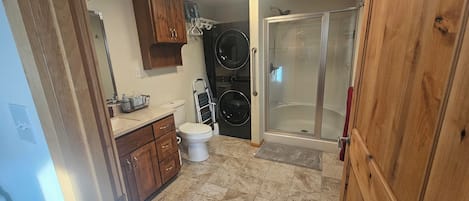 Shower, hair dryer, towels, soap