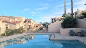A swimming pool with a no diving sign, surrounded by apartment buildings and palm trees. - Sparkling Clean 'Javelina Hideaway' in Beautiful Fountain Hills (Fountain Hills)