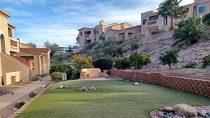 A well-maintained lawn with a rock garden and a brick wall. - Sparkling Clean 'Javelina Hideaway' in Beautiful Fountain Hills (Fountain Hills)