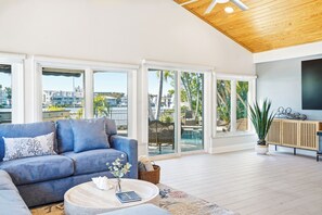 TV - Saltline | Waterfront Mid-Century Retreat w/ Heated Pool, Hot Tub, Dock & Golf Cart (Indian Rocks Beach)