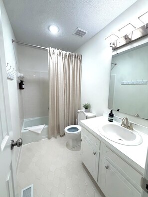 Hair dryer, towels, soap, shampoo