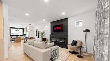 Télévision, cheminée, espaces bureaux