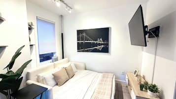 2 habitaciones, caja de seguridad en la habitación y escritorio