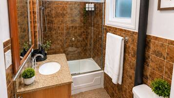 Hair dryer, towels, soap, shampoo