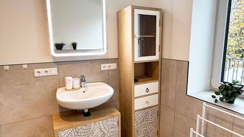 Hair dryer, towels, soap, toilet paper