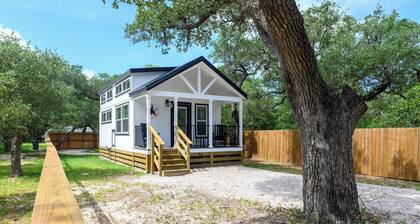 The Live Oak Tiny House with fence